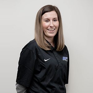 This is a staff photo featuring Nicole Perry Wilson who is the office coordinator with Apex Physical Therapy.